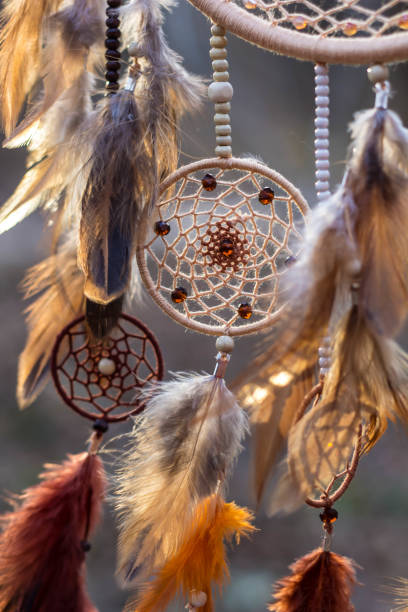 istock Dreamcatcher made of feathers, leather, beads, and ropes 638401240