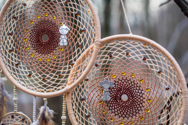 istock Dreamcatcher made of feathers, leather, beads, and ropes 638401364