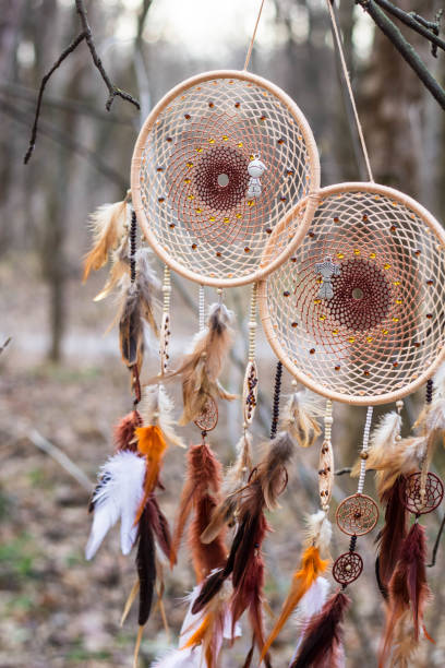 istock Dreamcatcher made of feathers, leather, beads, and ropes 638401384