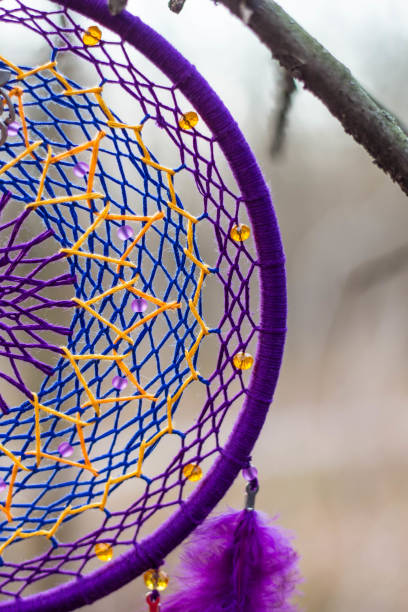 istock Dreamcatcher made of feathers, leather, beads, and ropes 638401650
