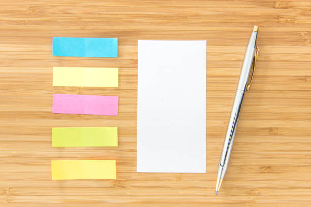 istock Notepaper, sticky notes and pen put on wooden desk 638401798