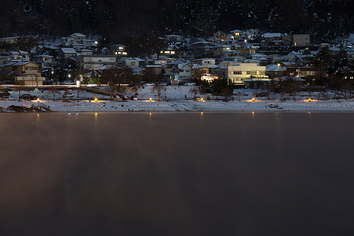 Fujikawaguchiko Town at night with Lake kawaguchi, Japan
