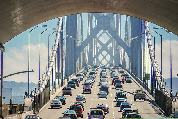 ponte della baia di san francisco - bay bridge car traffic transportation foto e immagini stock