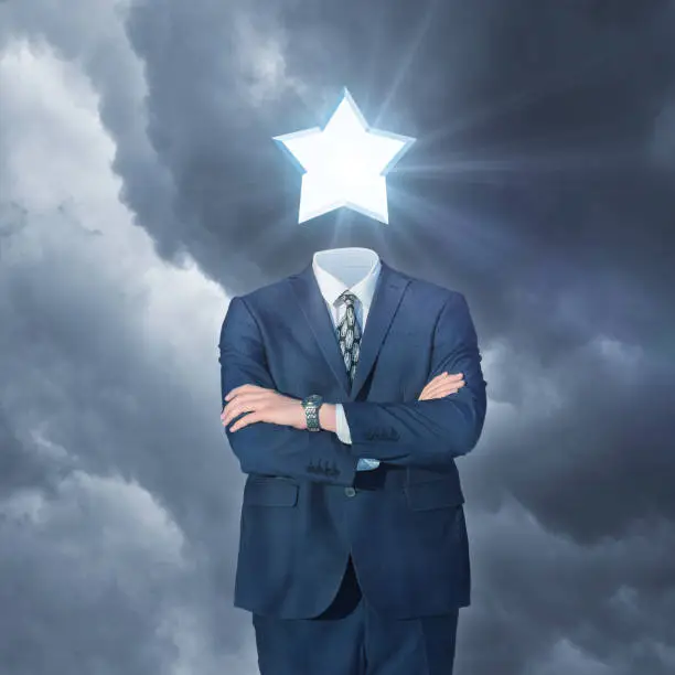 Photo of Businessman with star instead of the head.