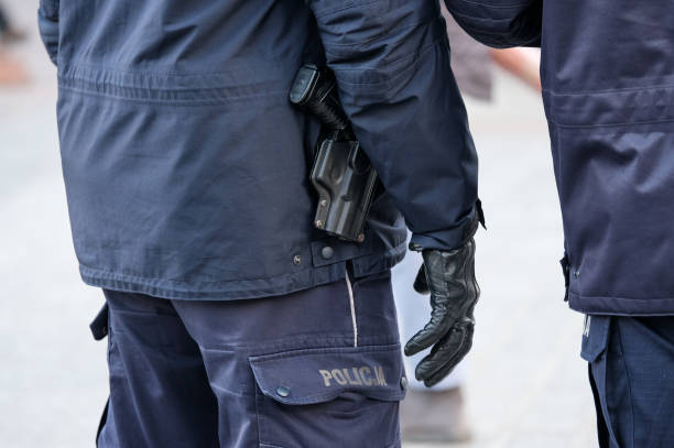 istock Armed with a pistol police ready to use weapons 638404908