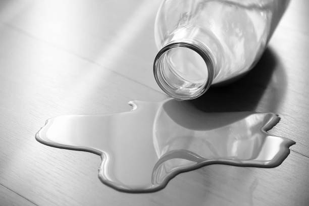istock Milk Bottle On The Wooden Ground 638404972