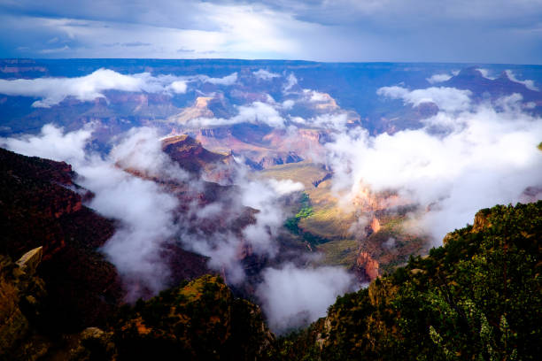istock Grand Canyon with clouds and sunlight 638406374