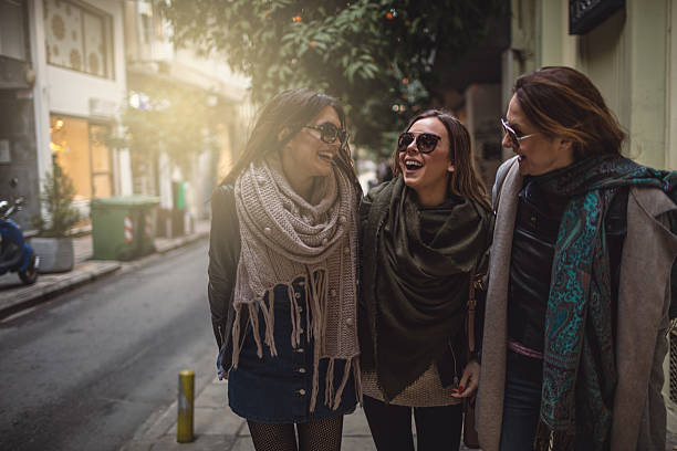 istock Friends walking in the city 638408714