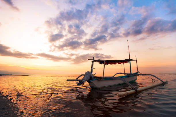 istock sunset on the beach in Bali 638409600