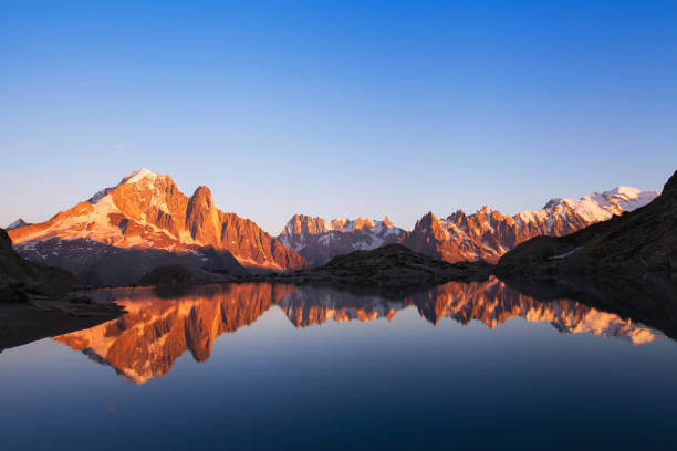 istock beautiful nature background, mountain landscape at sunset, panoramic view 638411760