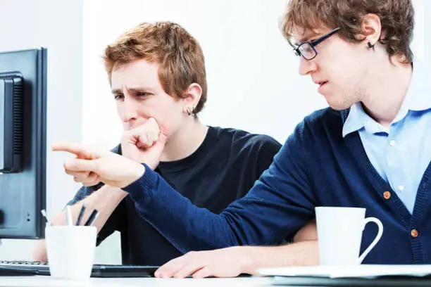 Photo of office worker pretending to understand