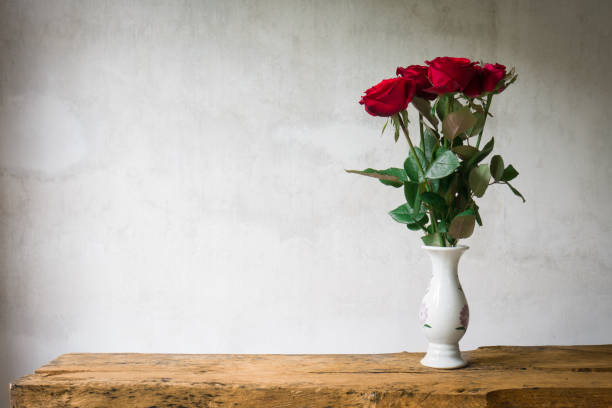 istock Still life bouquet red rose in vase. 638417642