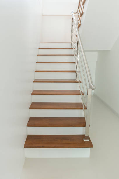istock Interior - wood stairs and handrail 638426500