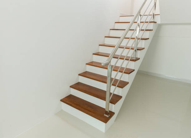 istock Interior - wood stairs and handrail 638426558