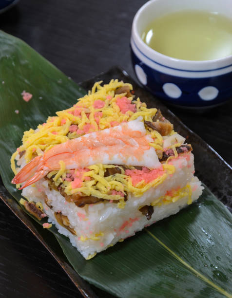 istock Shrimp sushi with green tea 638428696