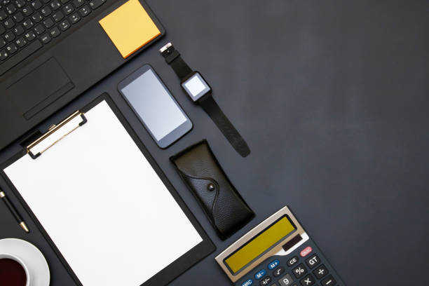 istock Black office table with supplies. Top view with copy space 638430894