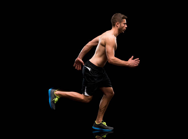 istock Shirtless male runner running 638433274