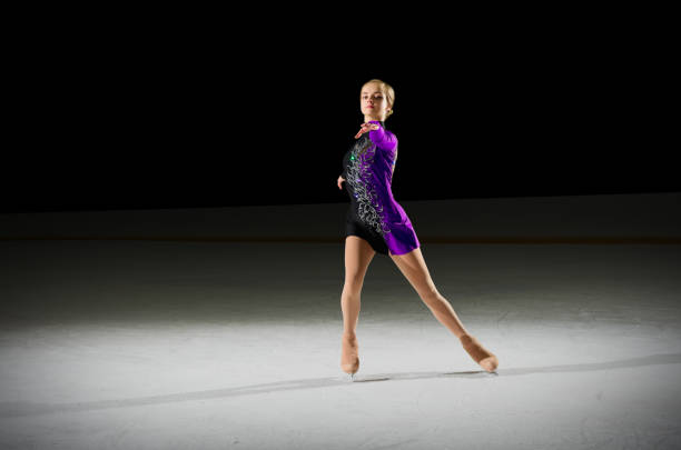 istock Young girl figure skater 638436396