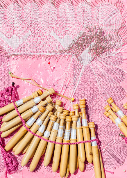 Manual lace trimming in vertical isolated photo
