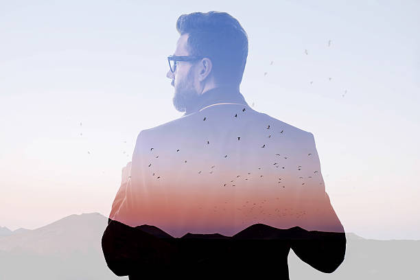 Double exposure portrait of a businessman