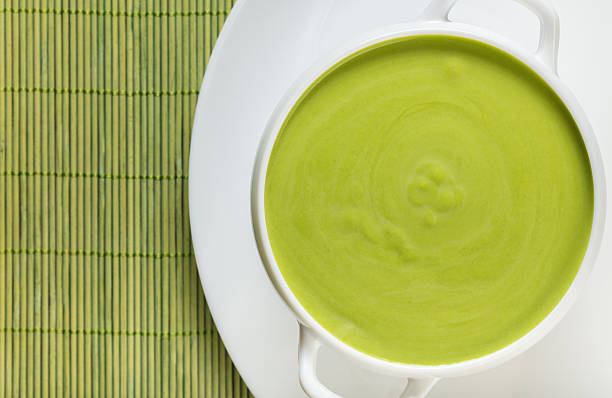 cream soup puree of green peas view from the top