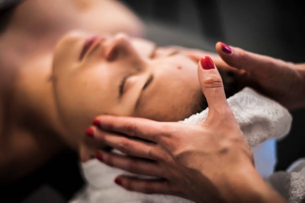 istock relax face massage in a wellness center and spa 638441108