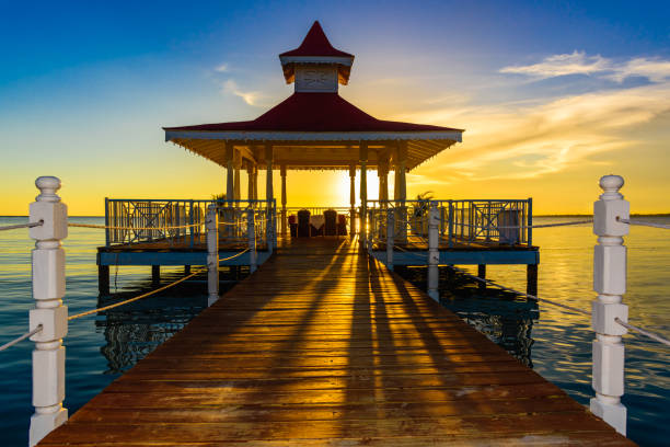 istock gazebo bridge sea at sunset 638444976