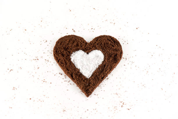 istock Grinded Coffee and Sugar Love Decoration on white background 638445066