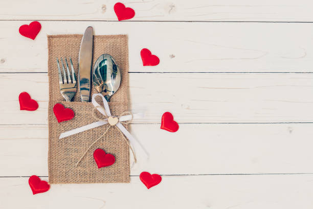 istock Table set for celebration Valentine's Day. Wooden table place se 638445464