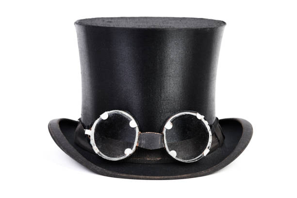 Steampunk has Black top hat with goggles isolated on white background steampunk fashion stock pictures, royalty-free photos & images