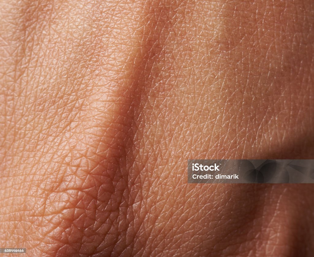 Cells on woman skin Cells on woman dark skin close up. Macro of human skin texture Textured Effect Stock Photo