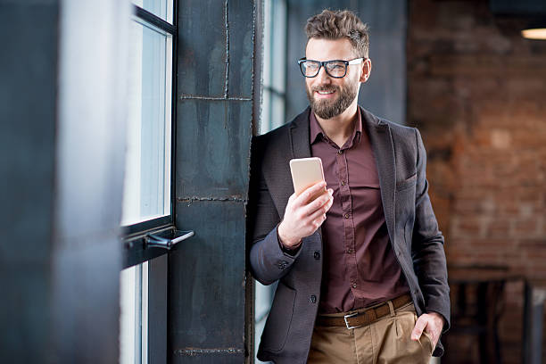 istock Businessman with smart phone 638446604