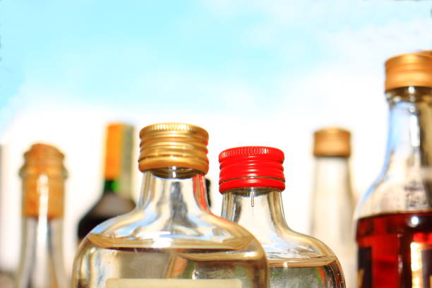 istock Neck bottles with different colored lids and alcohol 638446684