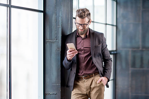 istock Business man with smart phone 638446884