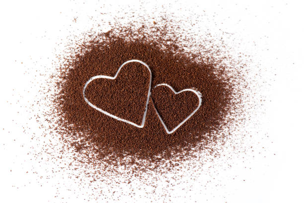 istock Grinded Coffee Love Decoration on white background 638447282