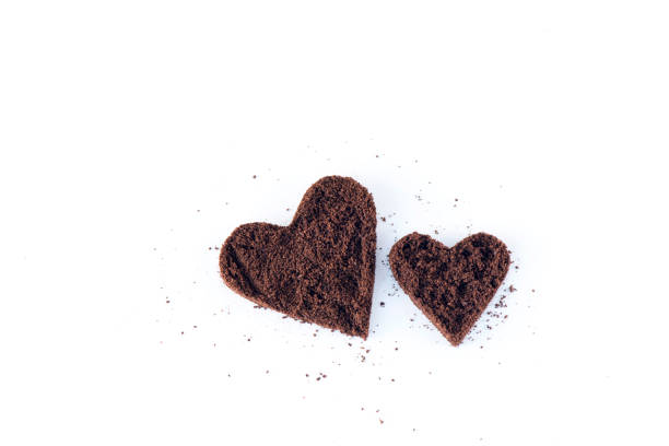 istock Grinded Coffee Love Decoration on white background 638447350