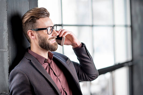 istock Businessman with smart phone 638447732