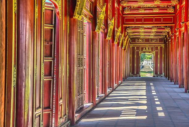 red doors in hue's imperial city, vietnam - palace entrance hall indoors floor imagens e fotografias de stock