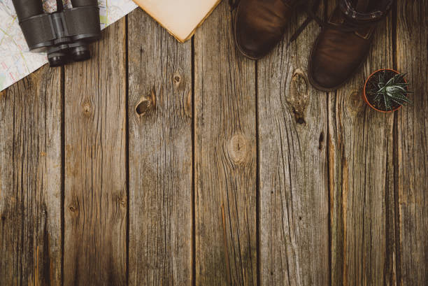 istock Travel accessories top view on wooden background with copy space 638449544