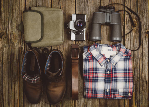 istock Travel accessories top view on wooden background with copy space 638449674