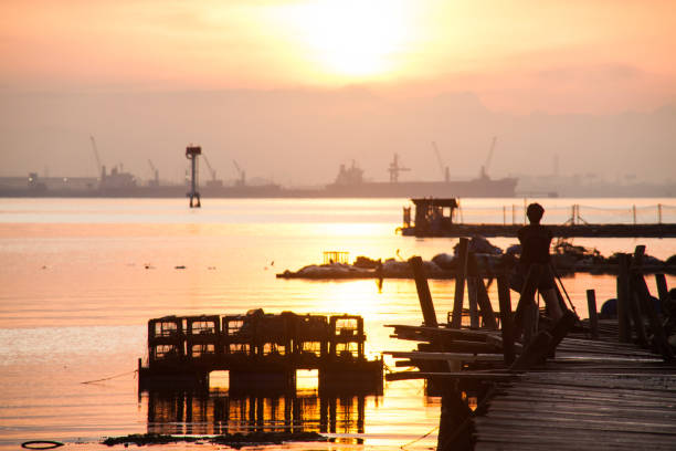 istock Wooden bridge sunrise for background 638450102