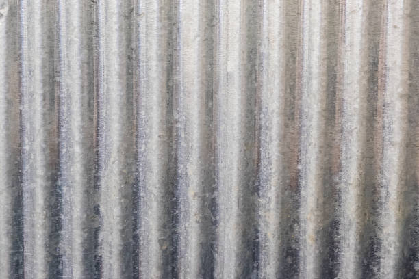 оцинкованной текстуры железного фона - corrugated iron tin rusty metallic стоковые фото и изображения