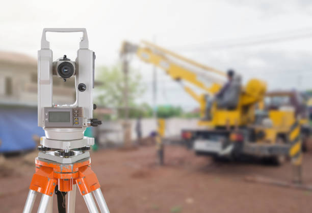 istock Survey equipment theodolite on a tripod. Isolated on white 638450992