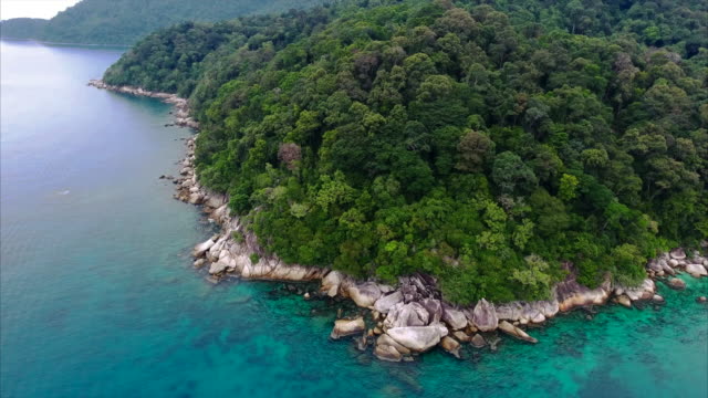 Aerial footage off the shores of a tropical Island