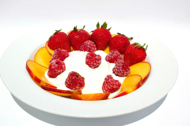 istock Healthy breakfast with coconut yoghurt, nectarine,strawberry and raspberry 638454596