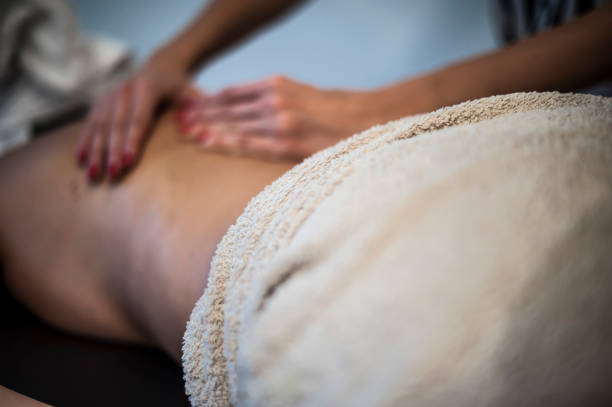 istock back massage in a wellness center 638456206