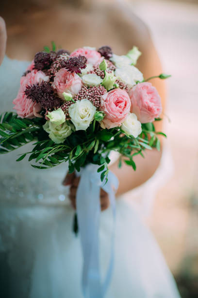 istock fresh bridal bouquet of roses  different colors 638457266