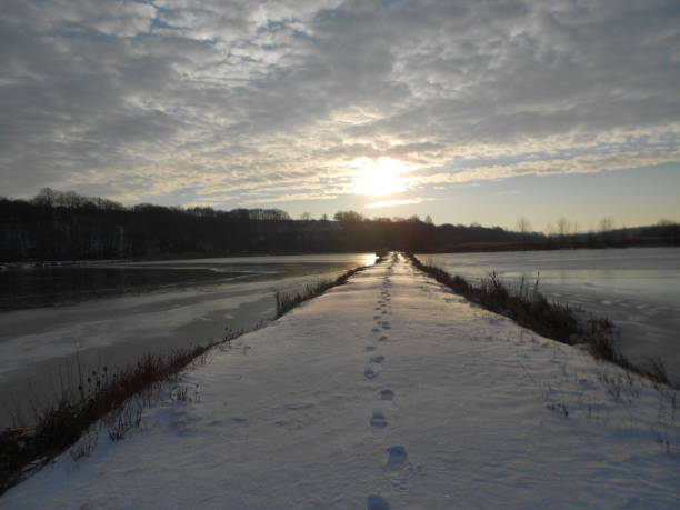 istock sunrise over the frozen lake 638458184