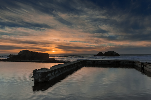 The Pacific Ocean and ruins of Sutro Baths, site of a large historical bathhouse.