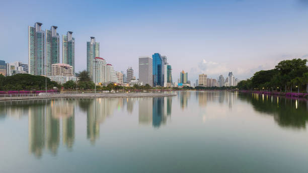 istock Bangkok city office building with water reflection 638460822